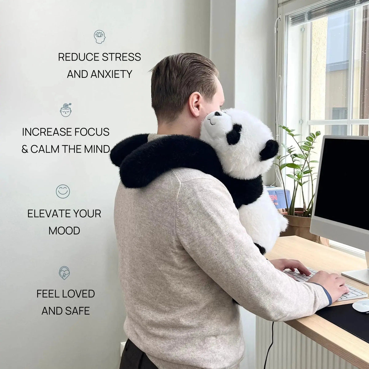 Long-armed plush stuffed animals including a sloth and red panda