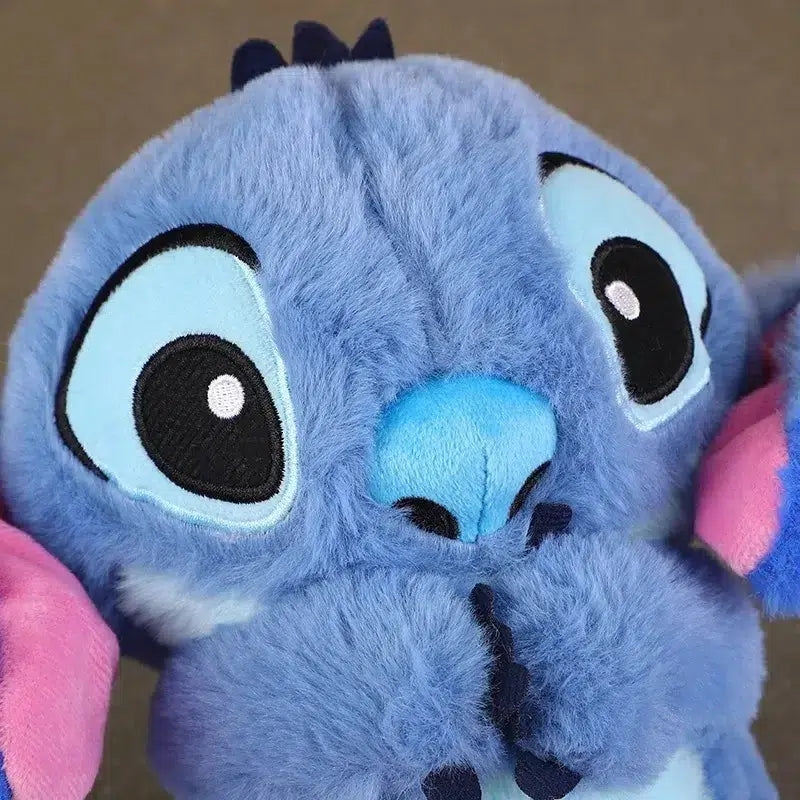 Soft character breathing plush toy with glowing belly