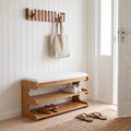 Bamboo shoe bench with white cushioned seat and two storage shelves