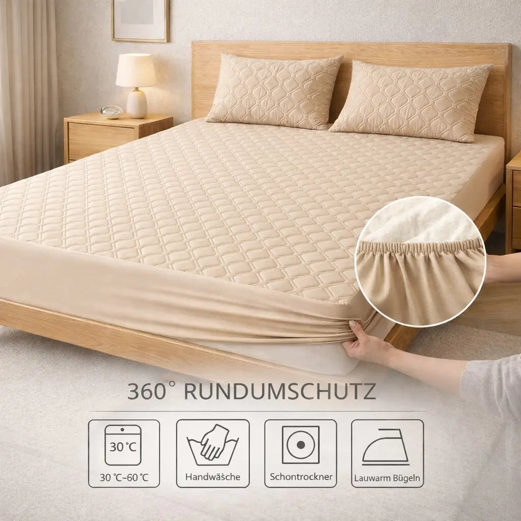 Quilted padded mattress topper with square stitch design on a bed