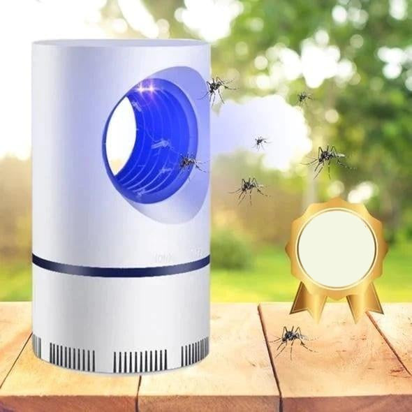 White cylindrical electric mosquito and fly trap with blue illuminated chamber and USB cable