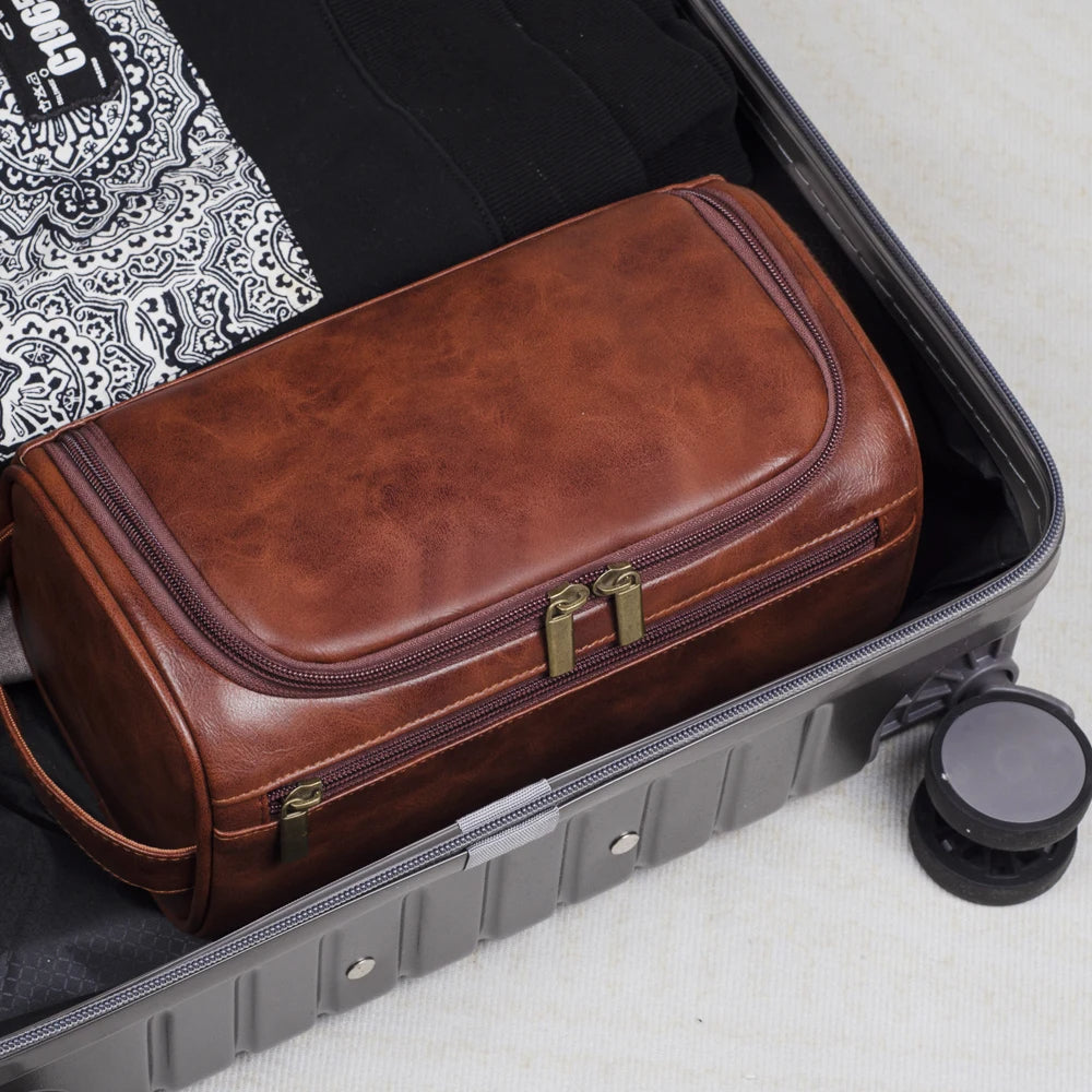 Structured toiletry bag with multiple zipped compartments and hanging hook
