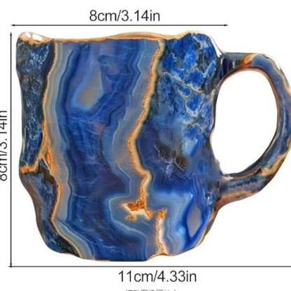Handmade mineral crystal mug with textured stone-effect finish and sculptural handle