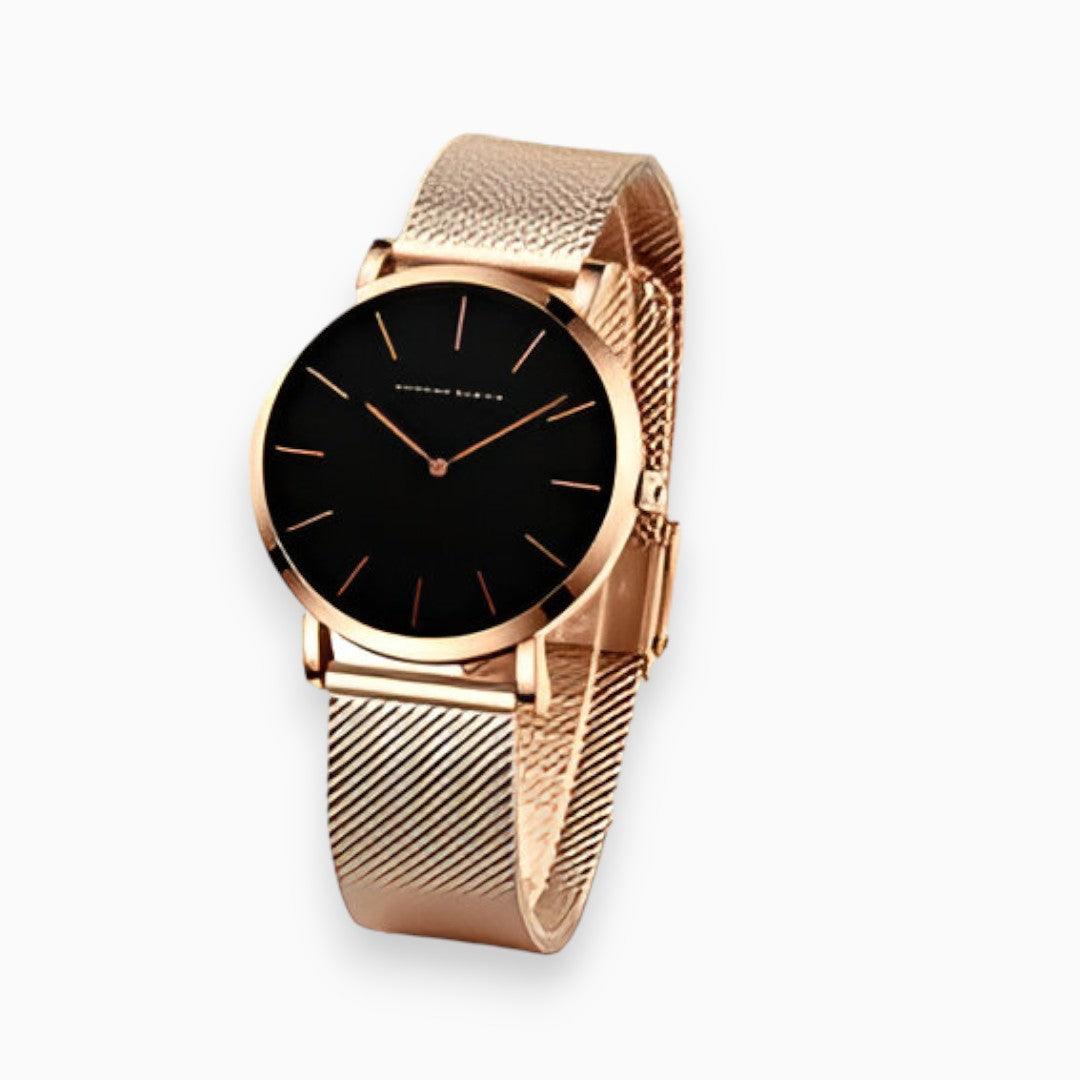 Analogue wristwatch with minimal round dial and textured mesh strap