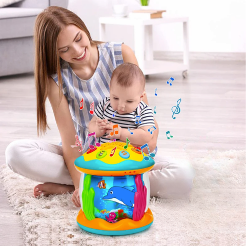Colourful rotating baby activity toy with musical buttons and sea-life details