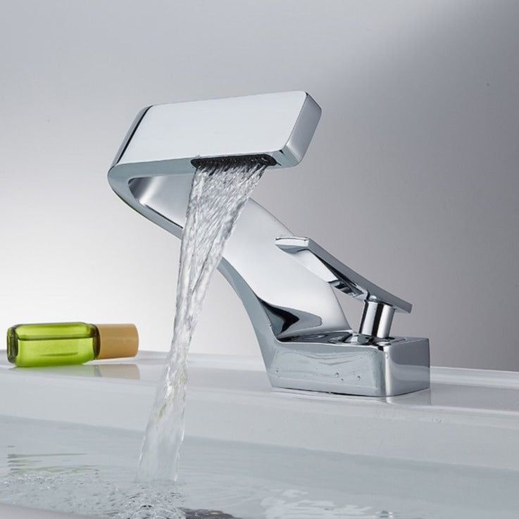 Curved bathroom basin faucet with waterfall-style spout and single lever