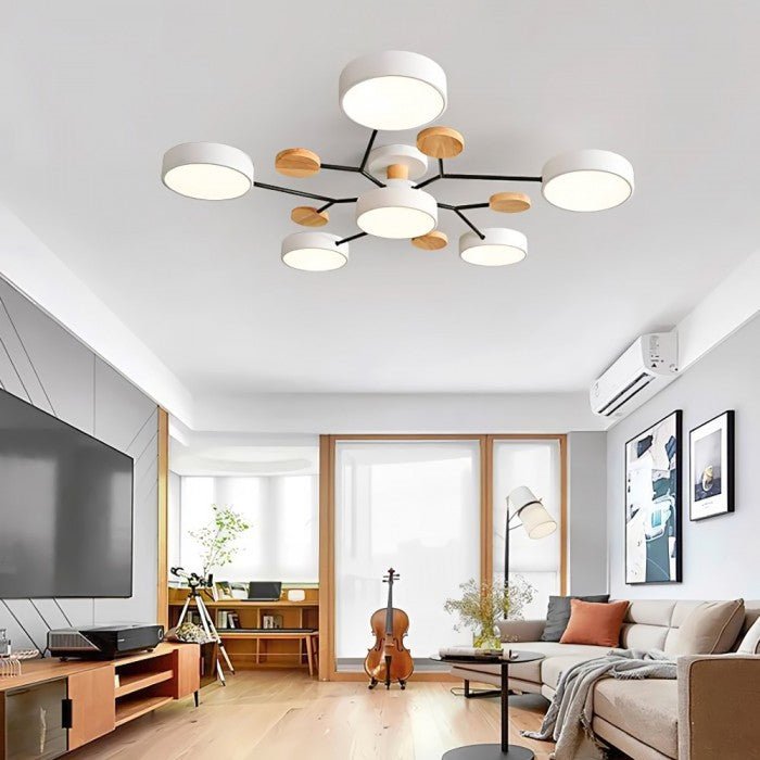 Multi-arm LED ceiling light with four round ring shades and oval decorative accents