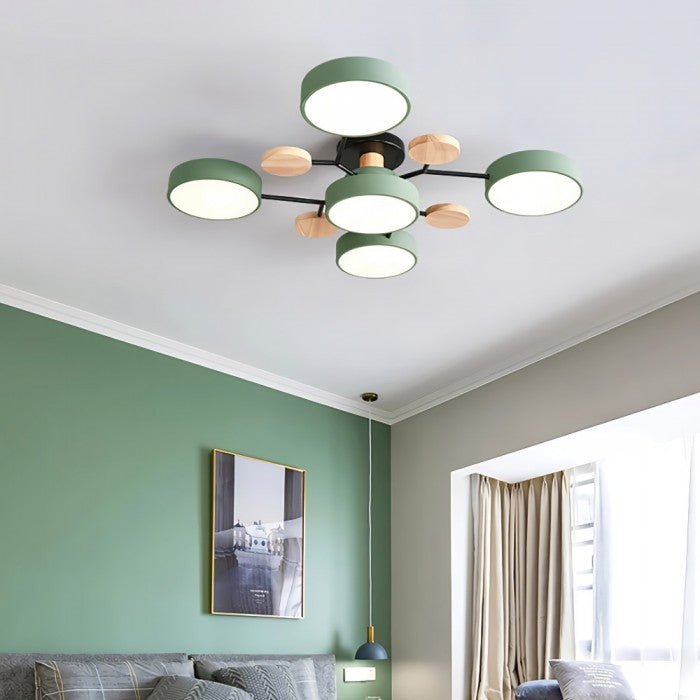 Multi-arm LED ceiling light with four round ring shades and oval decorative accents