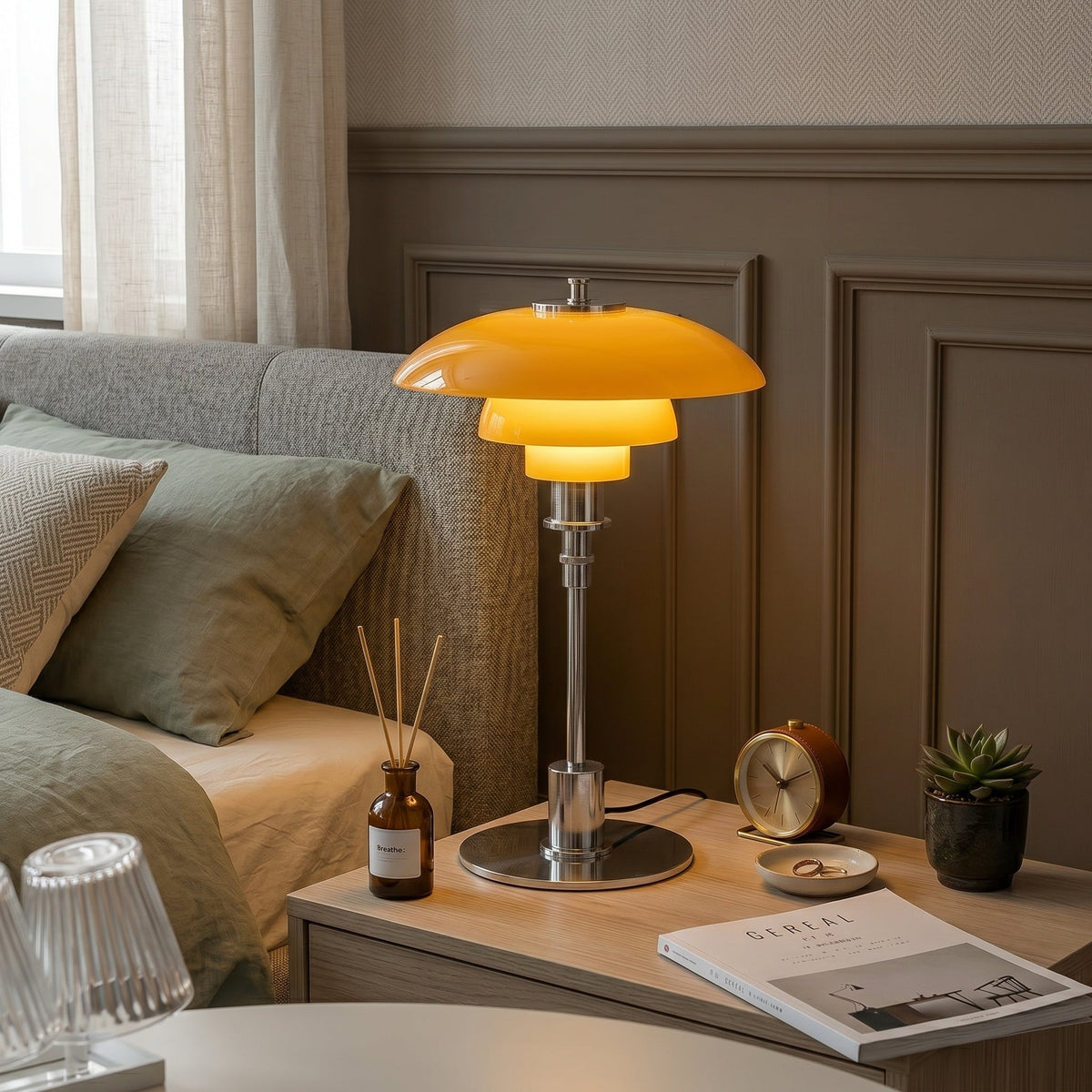 Layered LED table lamp with dome shade and circular metallic base