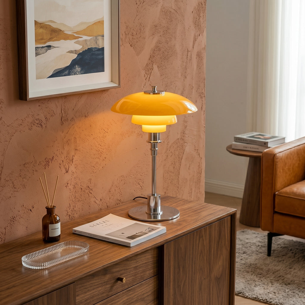 Layered LED table lamp with dome shade and circular metallic base