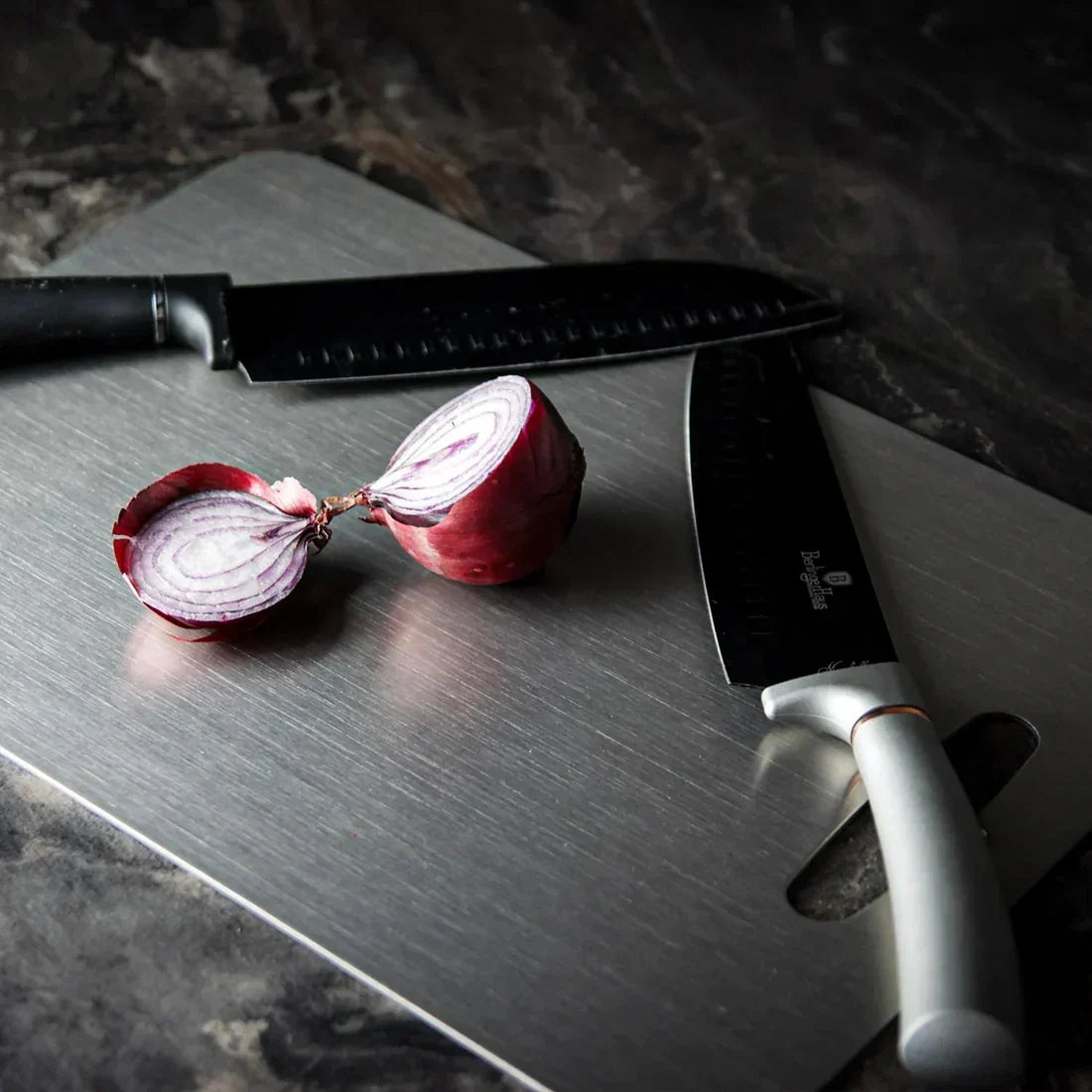 Silver titanium cutting board with integrated handle opening