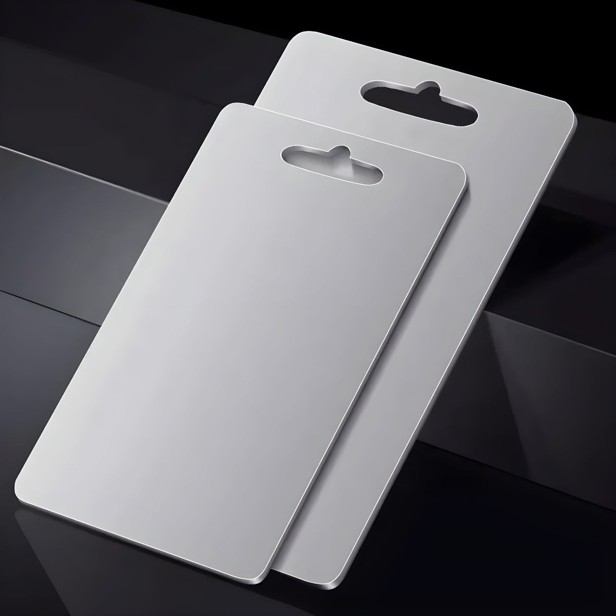 Silver titanium cutting board with integrated handle opening