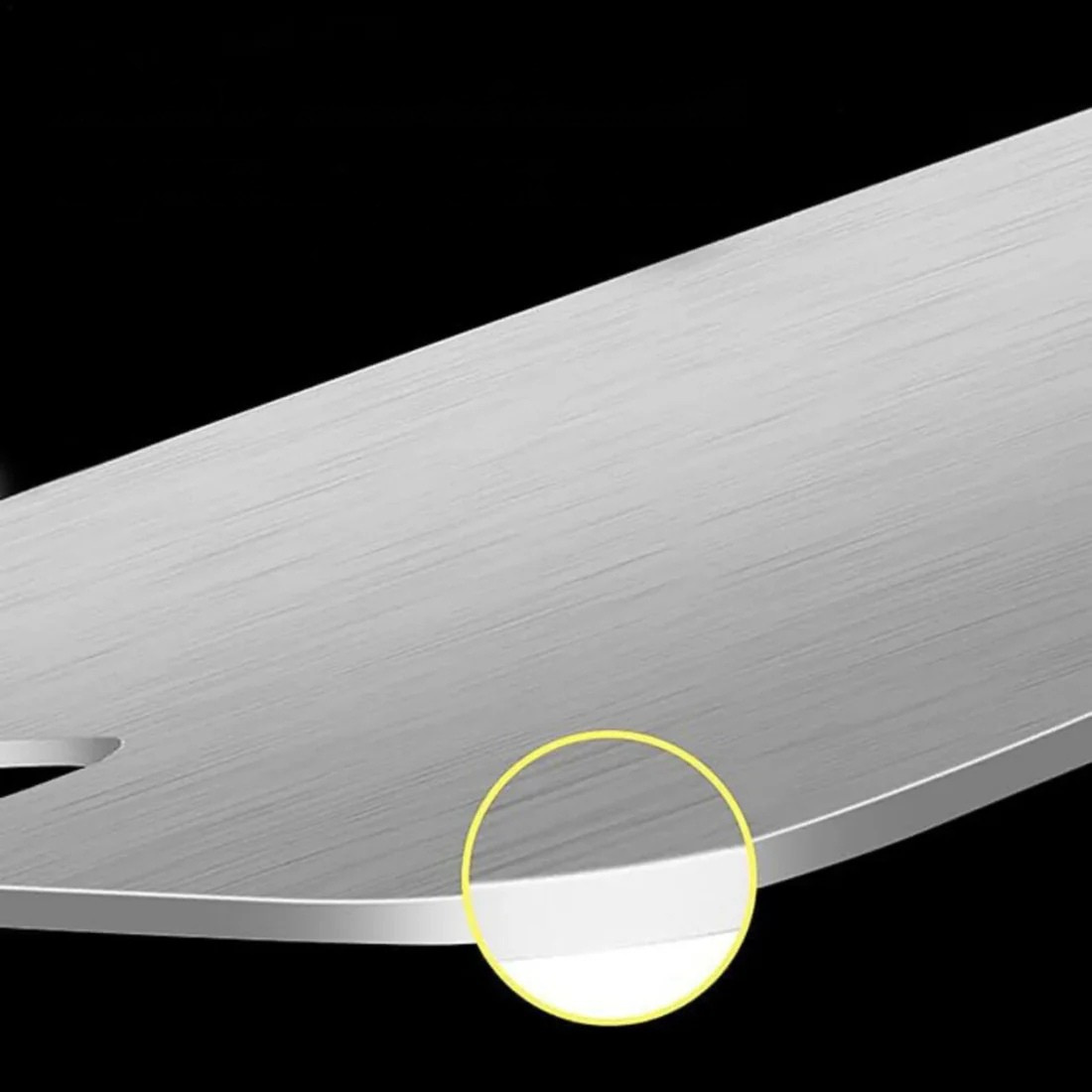 Silver titanium cutting board with integrated handle opening