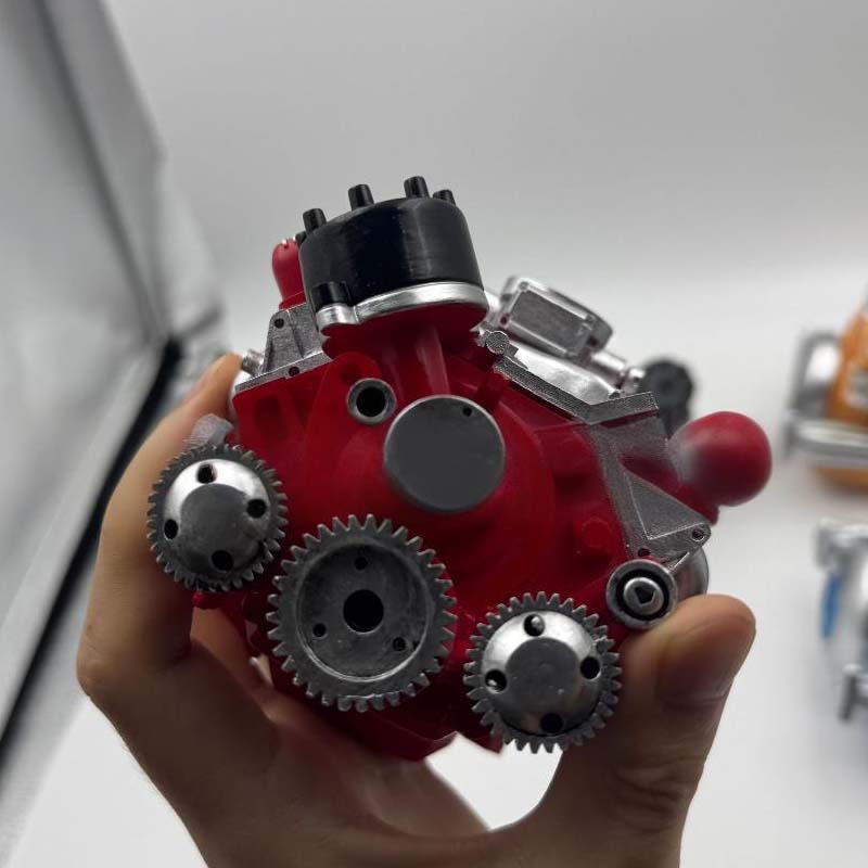 Miniature V8 OHV engine model kit with metal parts and instruction booklet