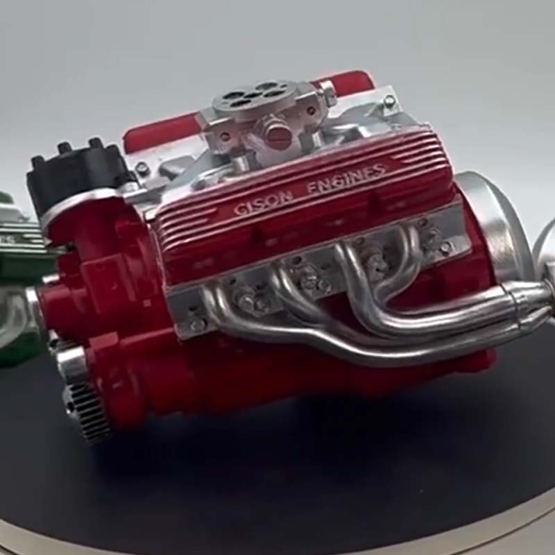Miniature V8 OHV engine model kit with metal parts and instruction booklet