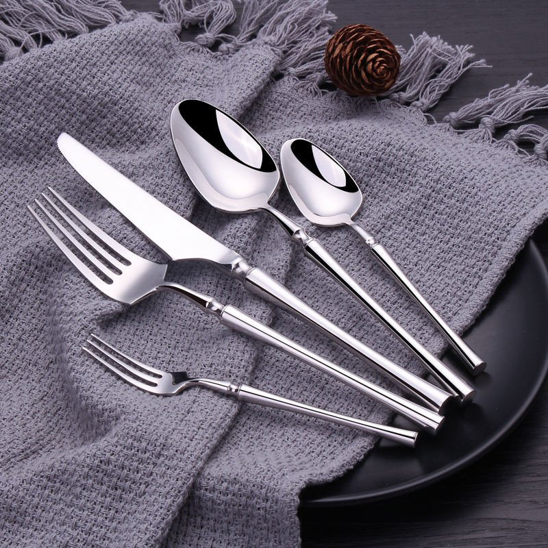24-piece polished stainless steel cutlery set with knives forks and spoons