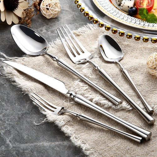 24-piece polished stainless steel cutlery set with knives forks and spoons