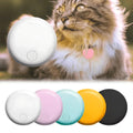 Round GPS cat tracker shown in multiple colours